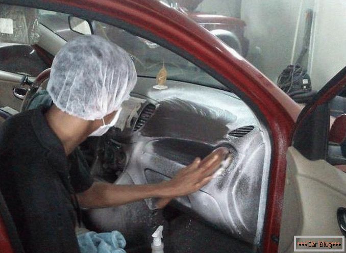 Dry cleaning the car interior with their own hands.