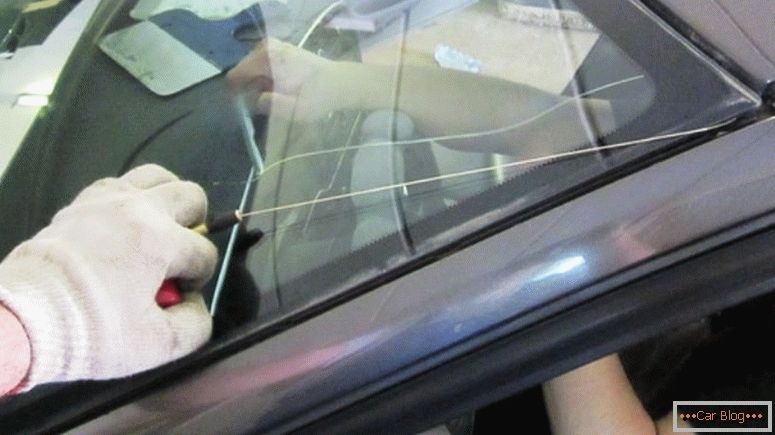 Cutting the windshield with a string