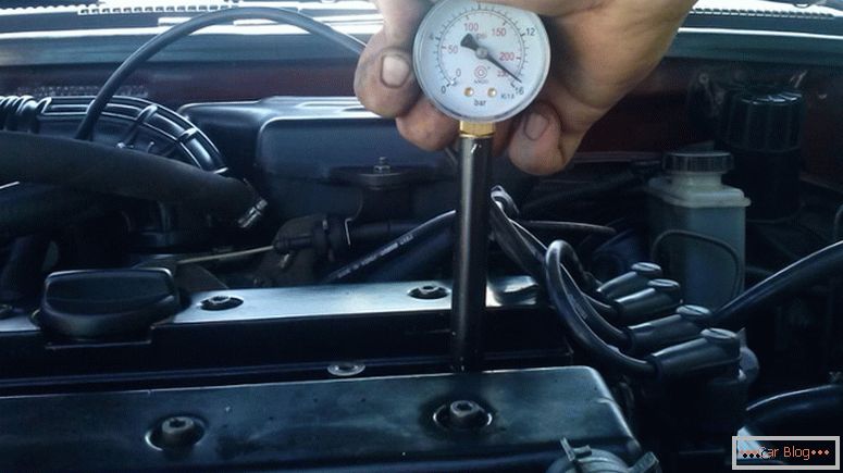 How to check engine compression with a compression gauge