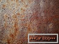 Photos of porous rust on the car body