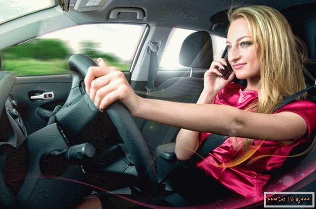 It is strictly forbidden to use the phone while driving.