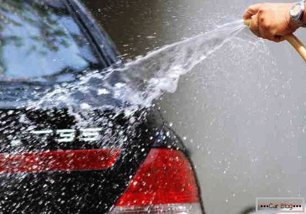 Washing a car with water