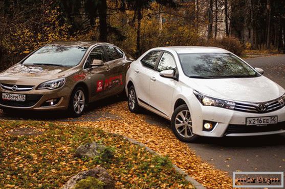 Cars Toyota Corolla and Opel Astra - another confrontation of Japanese innovation and German quality