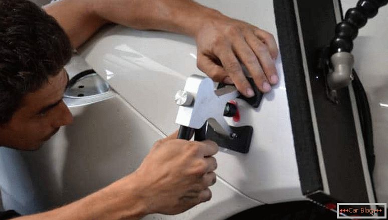 how to make the removal of dents on the car without painting their own hands