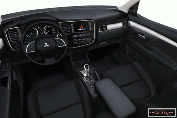 The interior of the car Mitsubishi Outlander is laconic and comfortable.