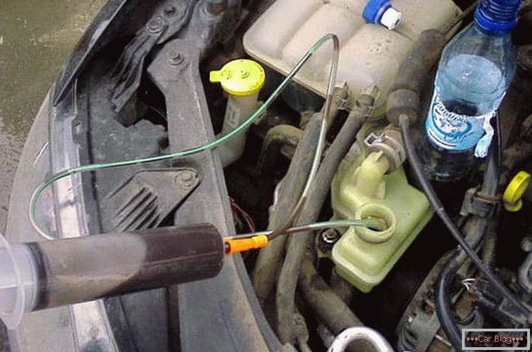 how to change the oil in the power steering